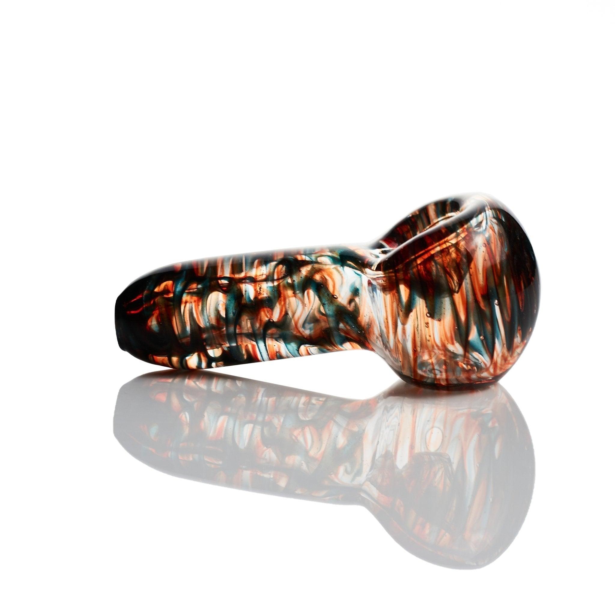 Close-up of vibrant colors on Westie Glass Colorful Red Blue Spoon Handpipe