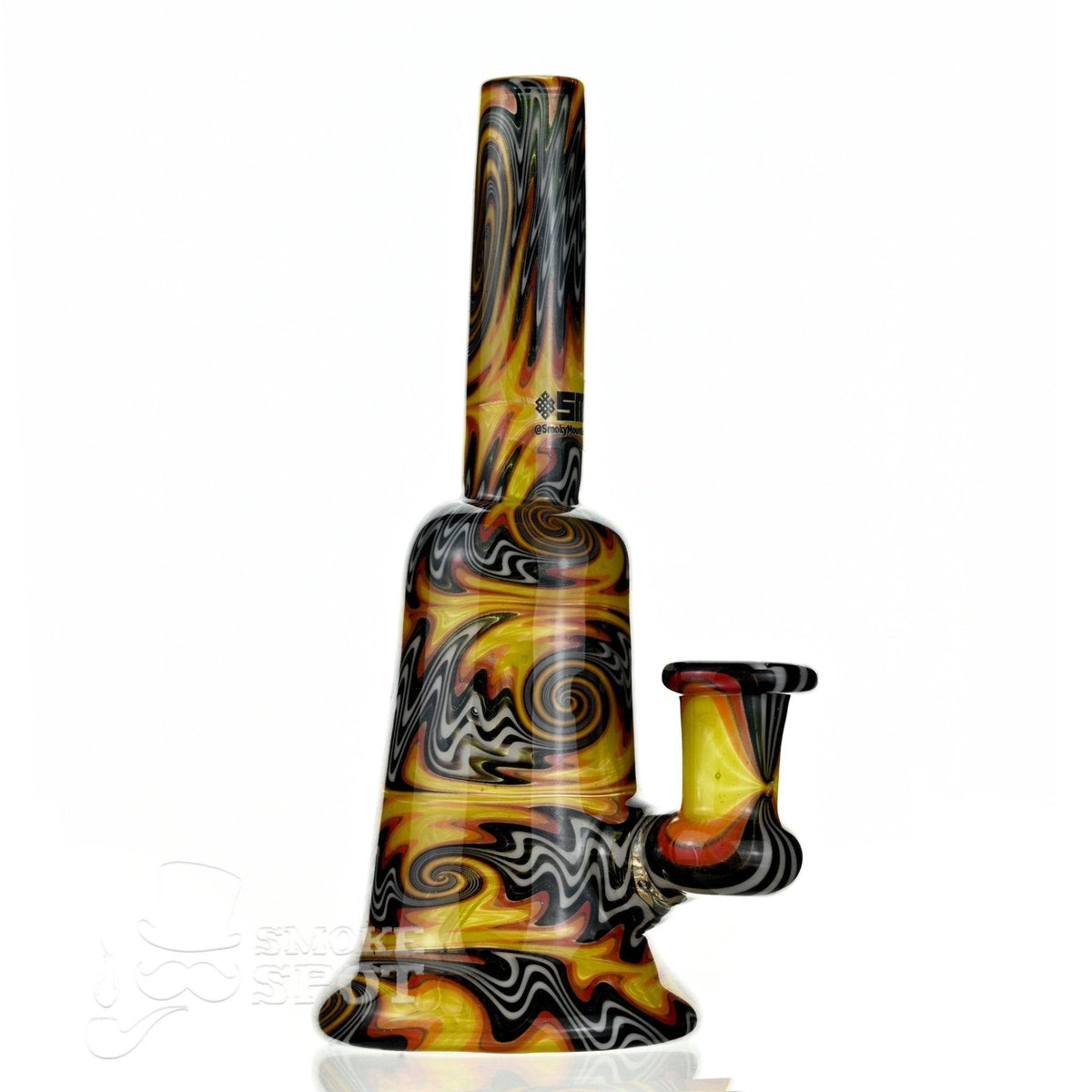 Close-up of wigwag pattern on 2 Kind Orange White Black Glass Rig