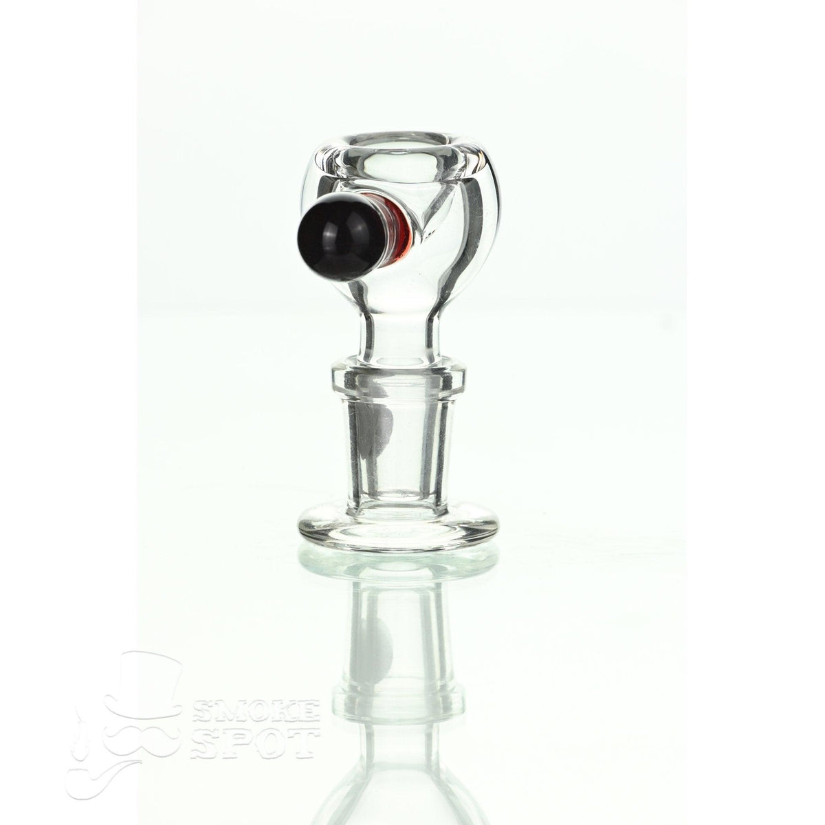 Close-up of Joe Madigan dry herb slide 14 mm red handle glass accessory
